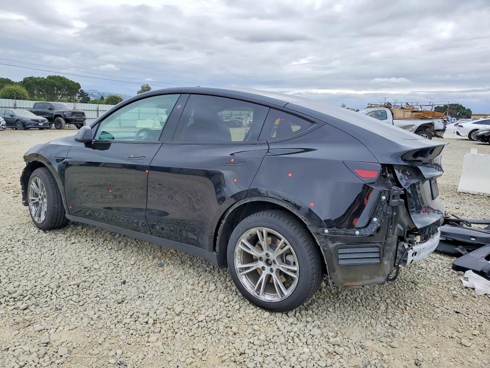 2023 Tesla Model y VIN 7SAYGDEE9PF812518 COPART salvage auction — SIDE, CA - SALVAGE CERTIFICATE, sold $9,000 on 2026-08-27 (photo 2)