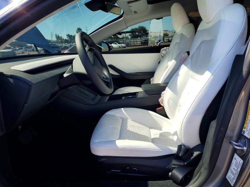 2025 Tesla VIN 5YJ3E1EA8SF937477 COPART salvage auction — SIDE, Ca - Salvage Certificate, sold $450 on 2026-07-21 (photo 7)