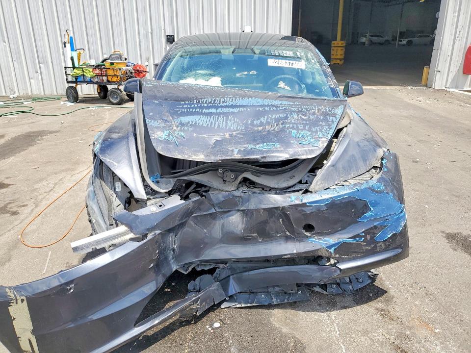 2024 Tesla Model 3 VIN 5YJ3E1EAXRF756164 COPART salvage auction — FRONT END, Fl - Certificate Of Title, sold $9,500 on 2026-07-09 (photo 5)