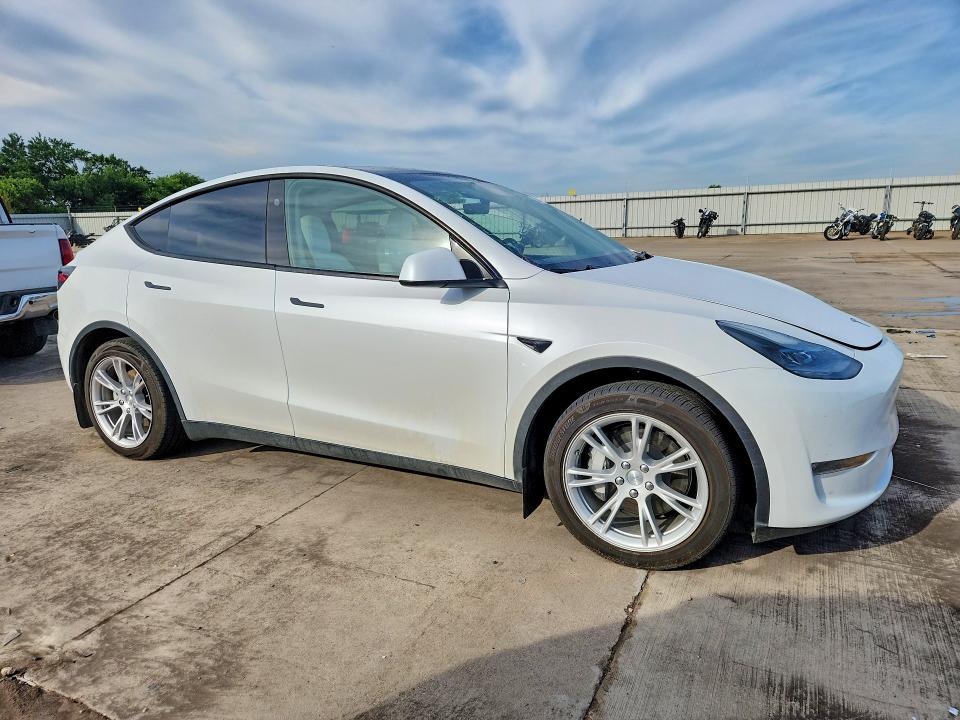2023 Tesla VIN 7SAYGDEE1PF871692 COPART salvage auction — UNDERCARRIAGE, Tx - Certificate Of Title, sold $225 on 2026-07-09 (photo 4)