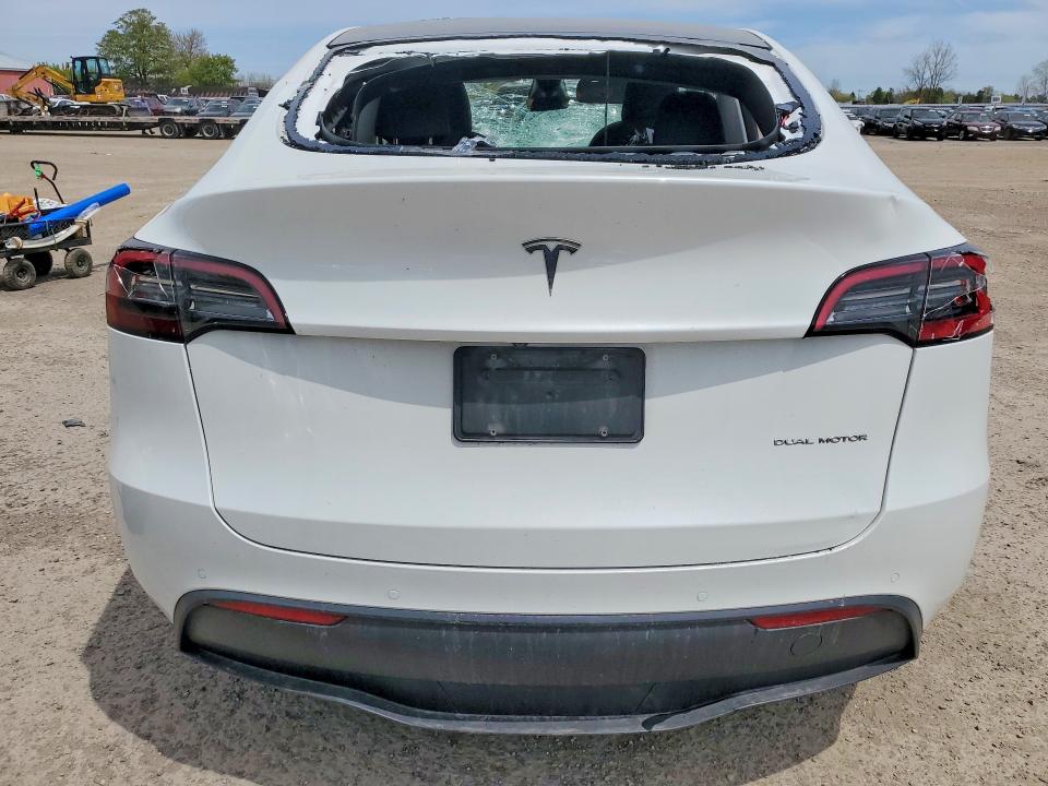 2023 Tesla Model y VIN 7SAYGAEE8PF583103 COPART salvage auction — VANDALISM, On - Permit No Brand - Unfit, sold $15,300 on 2026-07-03 (photo 6)