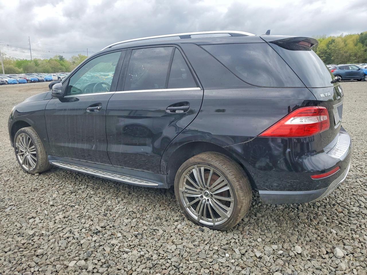 2014 Mercedes-Benz ML-Class VIN 4JGDA2EB1EA317822 COPART salvage auction — Minor Dent/Scratches, MA - CERTIFICATE OF TITLE (P), sold $3,950 on 2026-07-01 (photo 2)