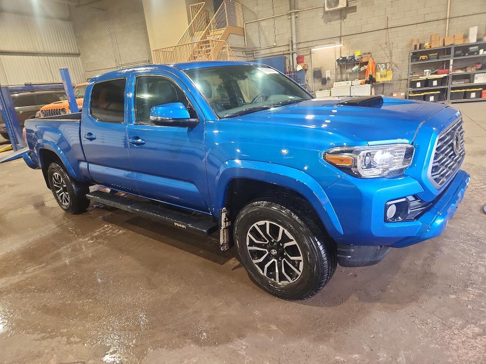 2023 Toyota Tacoma VIN 3TYDZ5BN5PT031317 COPART salvage auction — VANDALISM, On - Permit No Brand - Unfit, sold $28,000 on 2026-07-03 (photo 4)