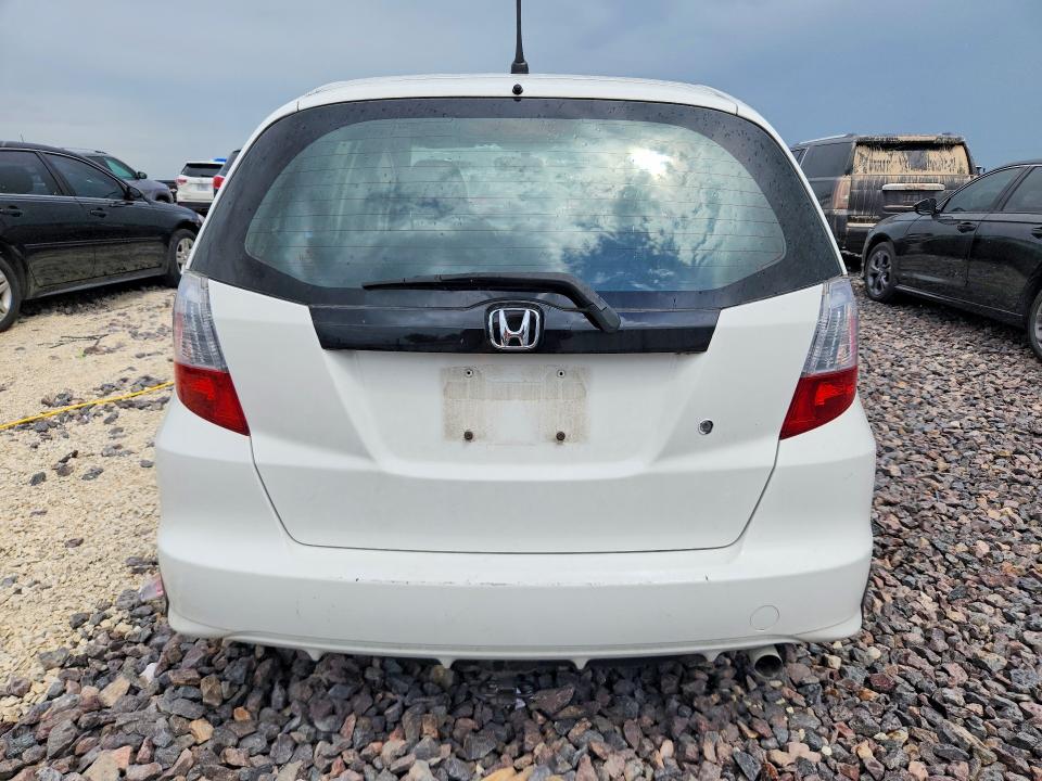 2010 Honda Fit VIN JHMGE8G26AC010455 COPART salvage auction — HAIL, Mo - Salvage Certificate Of Title, sold $3,100 on 2026-07-15 (photo 6)
