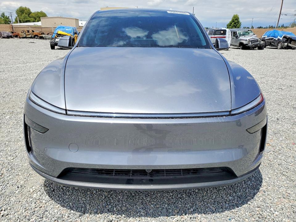 2026 Tesla VIN 7SAYGDED4TF414585 COPART salvage auction — SIDE, Ca - Salvage Certificate, sold $17,400 on 2026-07-08 (photo 5)