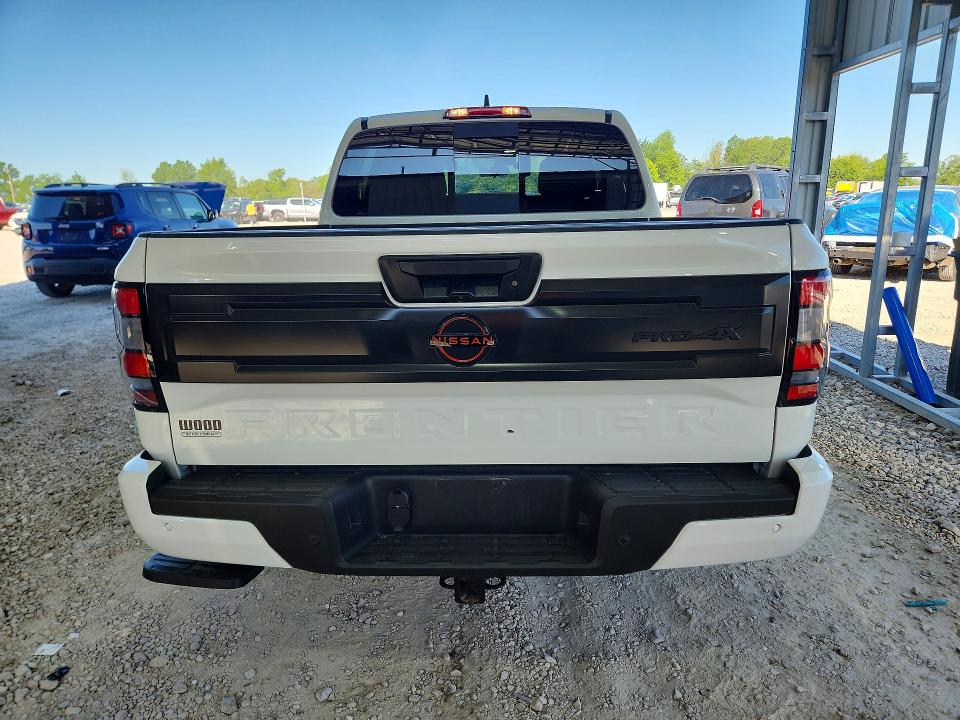 2026 Nissan Navara (frontier) VIN 1N6ED1EK5TN618669 COPART salvage auction — HAIL, MO - SALVAGE CERTIFICATE OF TITLE, sold $18,300 on 2026-10-06 (photo 6)