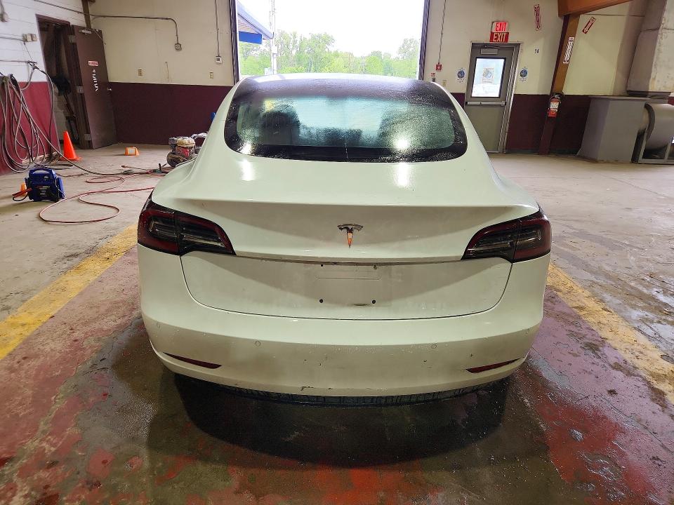 2018 Tesla Model 3 VIN 5YJ3E1EA1JF126506 COPART salvage auction — SIDE, Wv - Certificate Of Title, sold $6,500 on 2026-07-23 (photo 6)