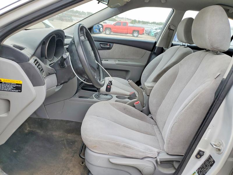 2009 Kia Optima VIN KNAGE228195282998 COPART salvage auction — HAIL, Ia - Cert Of Title-Salvage Title, sold $650 on 2026-07-15 (photo 7)