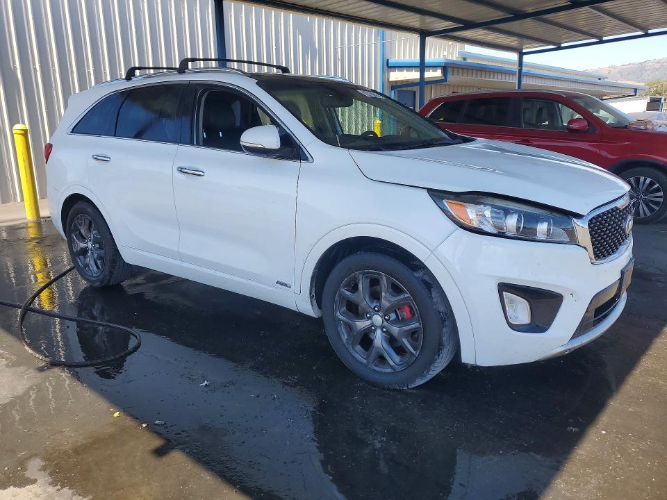 2016 Kia Sorento VIN 5XYPKDA53GG170058 COPART salvage auction — SIDE, Ca - Certificate Of Title, sold $2,550 on 2026-07-09 (photo 4)