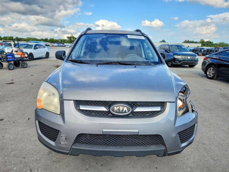 2009 Kia Sportage VIN KNDJF724397603038 COPART salvage auction — FRONT END, FL - CERT OF TITLE SLVG REBUILDABLE, sold $1,300 on 2026-07-13 (photo 5)