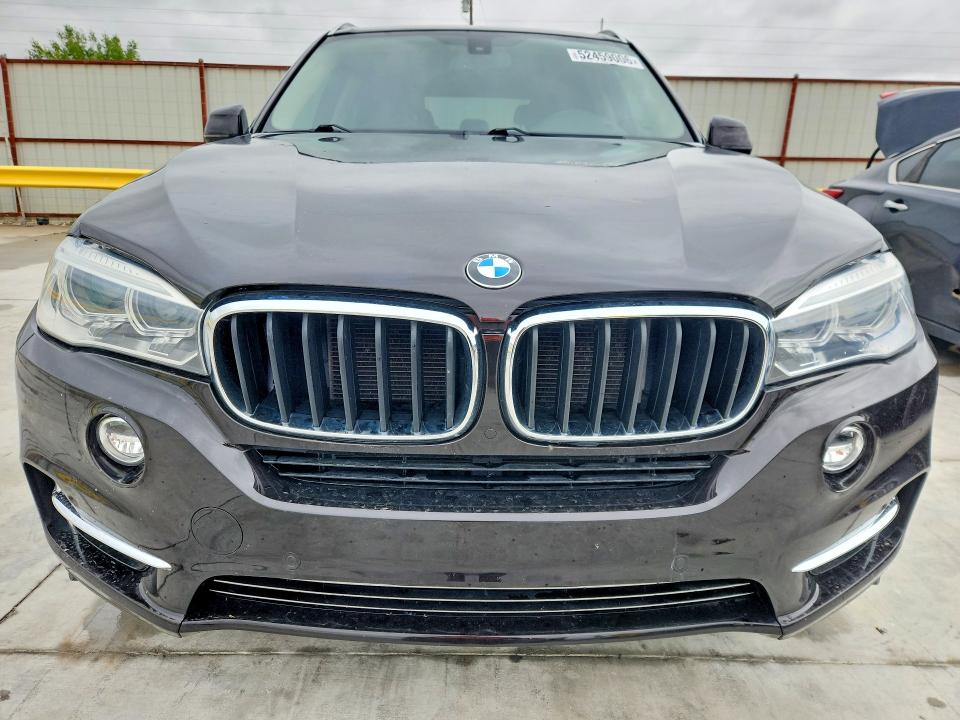 2015 BMW VIN 5UXKR0C55F0P16079 COPART salvage auction — HAIL, TX - CERTIFICATE OF TITLE, sold $7,200 on 2026-07-31 (photo 5)