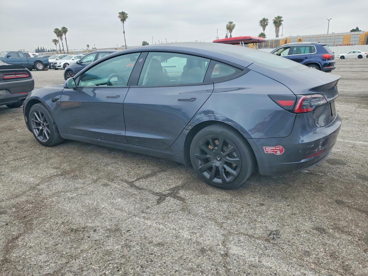 2021 Tesla Model 3 VIN 5YJ3E1EA5MF100589 COPART salvage auction — Rear End, CA - SALVAGE CERTIFICATE, sold $8,500 on 2026-07-10 (photo 2)