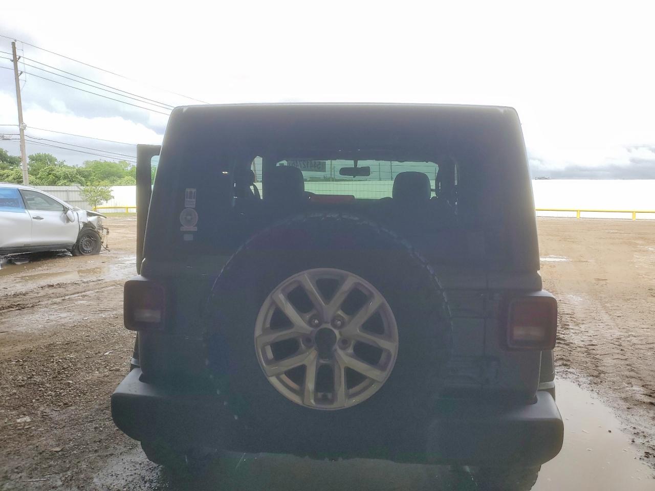 2023 Jeep Wrangler VIN 1C4GJXAN9PW656476 COPART salvage auction — Front End, TX - SALVAGE VEHICLE TITLE, sold $12,100 on 2026-07-02 (photo 6)