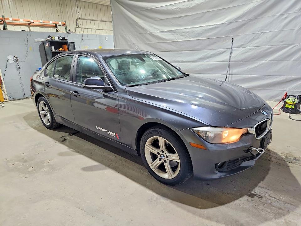 2014 BMW 3 series VIN WBA3C3G50ENS69369 COPART salvage auction — MECHANICAL, Nh - Cert Of Title-Rebuilt Vehicle, sold $2,600 on 2026-08-20 (photo 4)
