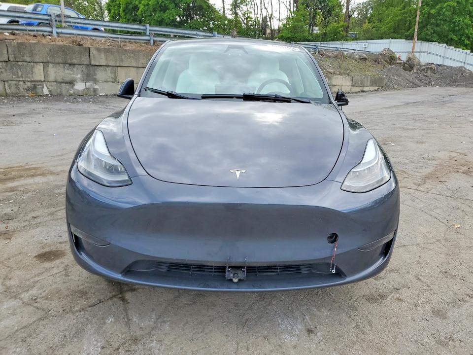 2023 Tesla Model y VIN 7SAYGDEE6PF868433 COPART salvage auction — SIDE, NY - MV-907A SALVAGE CERTIFICATE, sold $7,500 on 2026-07-28 (photo 5)