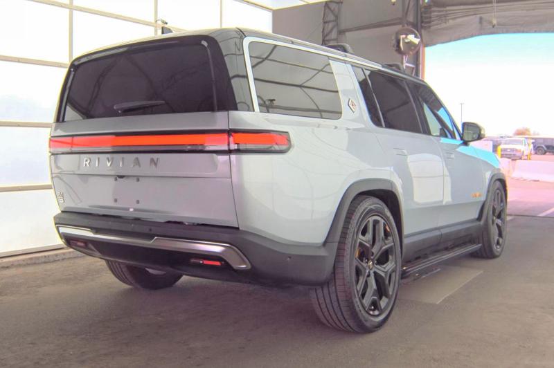 2023 Rivian R1s VIN 7PDSGABA4PN019950 COPART salvage auction — Normal Wear, MA - CERT OF TITLE-SALVAGE (P), sold $43,500 on 2026-06-08 (photo 4)