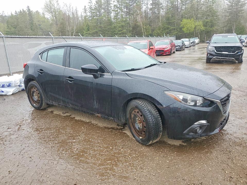 2014 Mazda VIN JM1BM1L70E1155399 COPART salvage auction — MINOR DENT/SCRATCHES, On - Permit Rebuilt - Unfit, sold $550 on 2026-07-03 (photo 4)