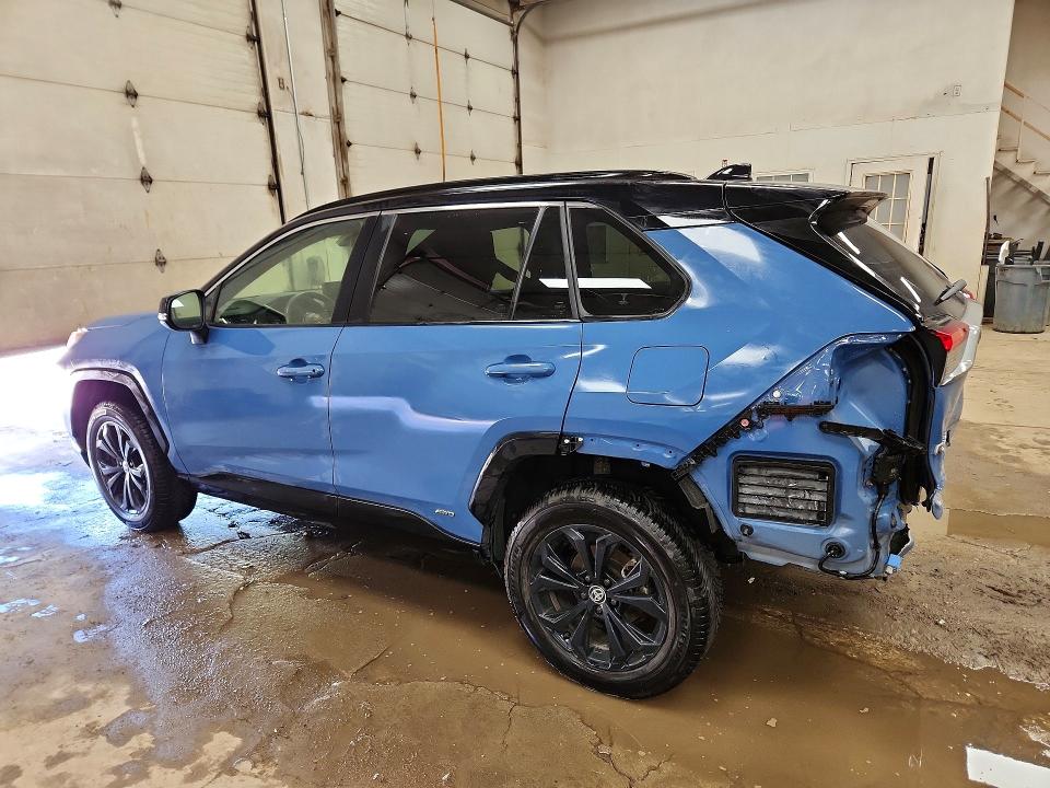 2023 Toyota Rav 4 VIN JTME6RFV2PJ040113 COPART salvage auction — REAR END, MI - CERTIFICATE OF TITLE, sold $14,100 on 2026-07-22 (photo 2)