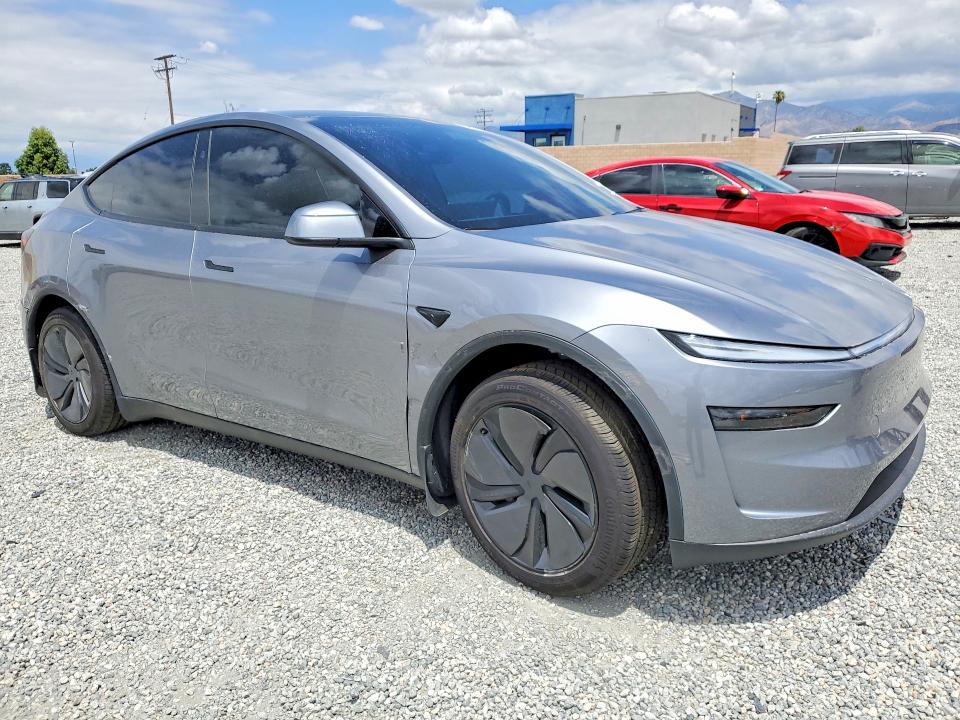 2026 Tesla VIN 7SAYGDED4TF414585 COPART salvage auction — SIDE, Ca - Salvage Certificate, sold $17,400 on 2026-07-08 (photo 4)