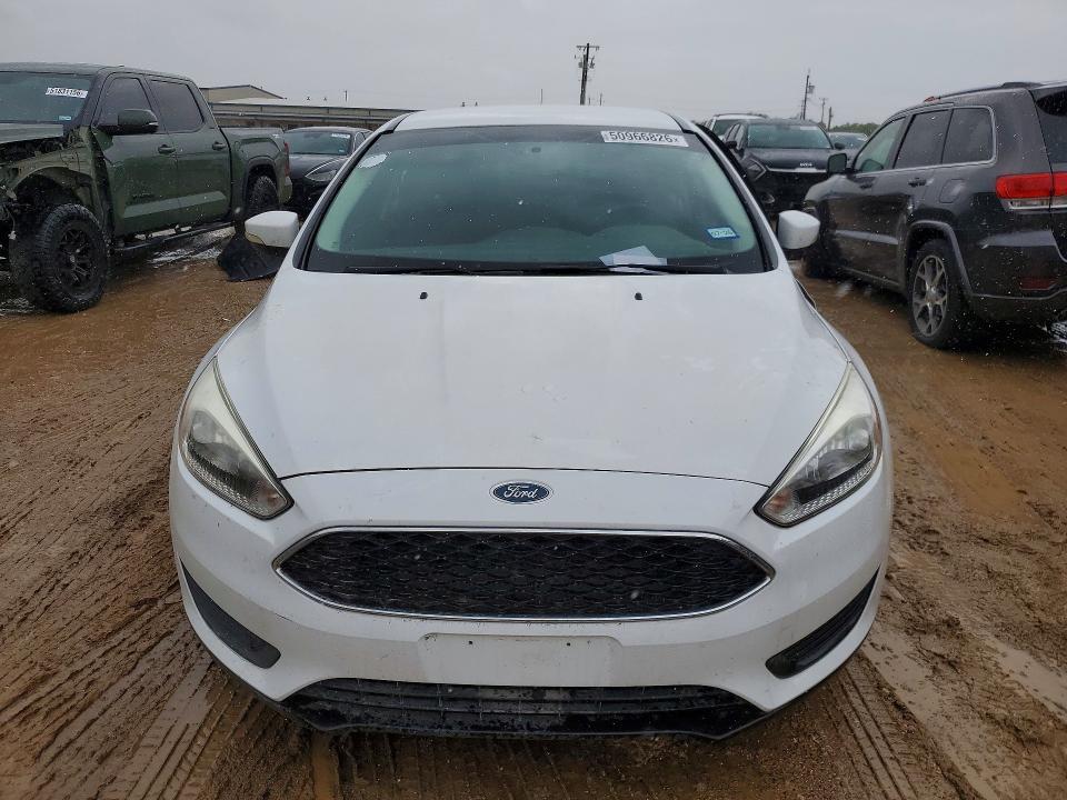 2017 Ford Focus VIN 1FADP3F27HL300674 COPART salvage auction — SIDE, Tx - Salvage Vehicle Title, sold $2,900 on 2026-07-02 (photo 5)