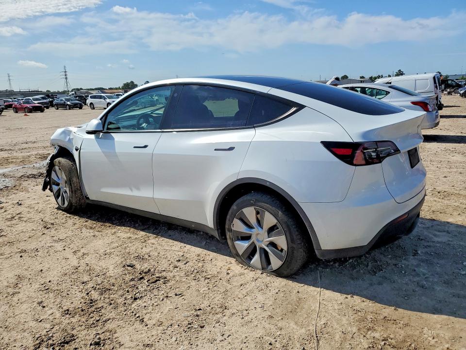 2023 Tesla VIN 7SAYGDEE0PA090319 COPART salvage auction — FRONT END, TX - SALVAGE VEHICLE TITLE, sold $8,500 on 2026-07-31 (photo 2)