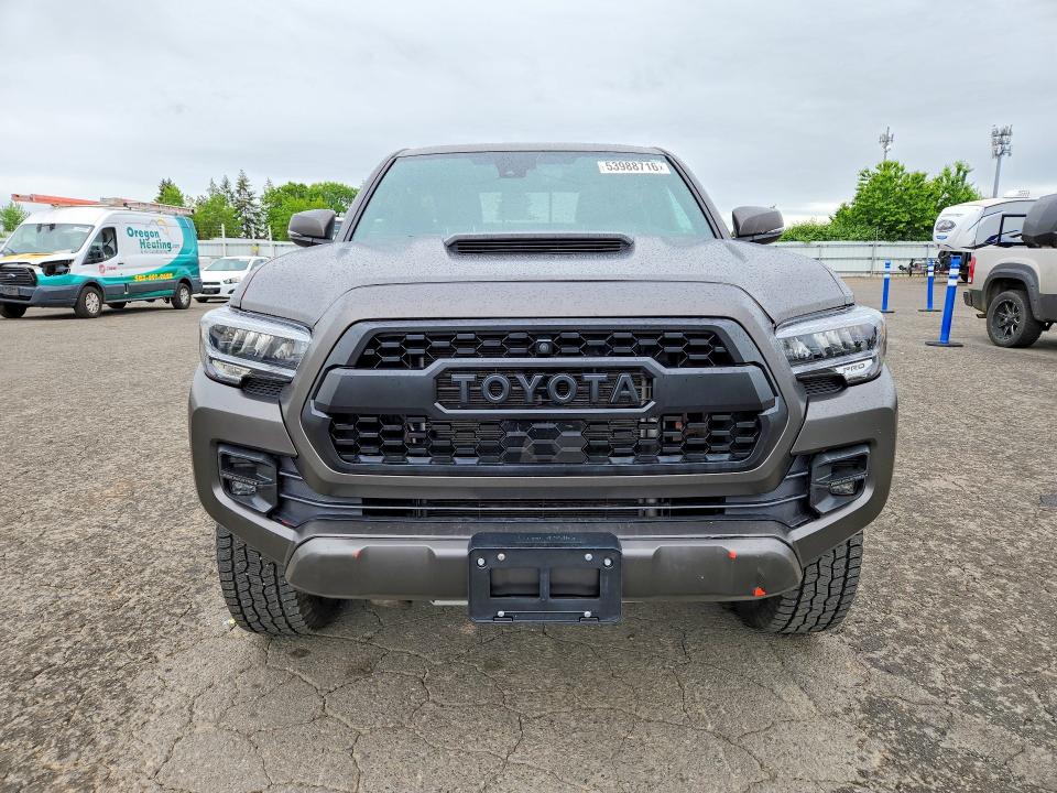 2023 Toyota Tacoma VIN 3TYCZ5AN4PT113195 COPART salvage auction — SIDE, Or - Salvage Title Certificate, sold $23,600 on 2026-07-20 (photo 5)