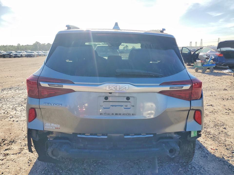 2023 Kia Seltos VIN KNDEU2AA2P7392106 COPART salvage auction — SIDE, Tx - Salvage Vehicle Title, sold $3,400 on 2026-07-21 (photo 6)
