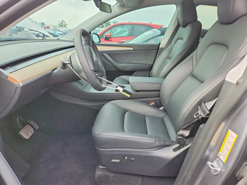 2024 Tesla Model y VIN 7SAYGDEEXRA320838 COPART salvage auction — MINOR DENT/SCRATCHES, Tx - Certificate Of Title (P), sold $20,600 on 2026-07-13 (photo 7)
