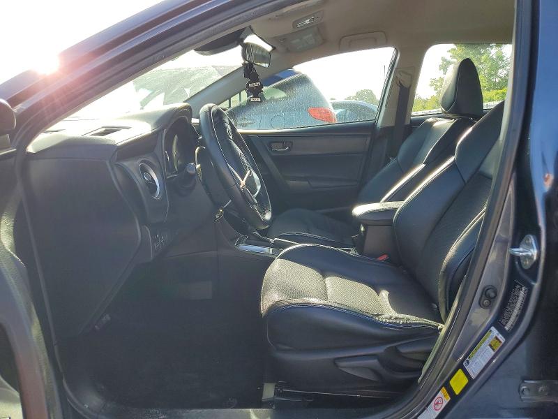 2018 Toyota Corolla VIN 5YFBURHEXJP842546 COPART salvage auction — SIDE, Fl - Cert Of Title Slvg Rebuildable, sold $3,250 on 2026-07-17 (photo 7)