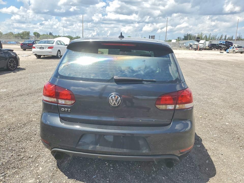2013 Volkswagen Gti VIN WVWGV7AJ1DW122305 COPART salvage auction — MINOR DENT/SCRATCHES, Mt - Certificate Of Title, sold $2,700 on 2026-07-09 (photo 6)