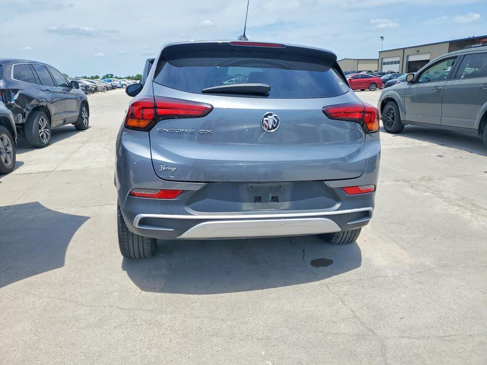 2021 Buick Encore VIN KL4MMBS21MB067145 COPART salvage auction — SIDE, Tx - Salvage Vehicle Title, sold $3,550 on 2026-07-13 (photo 6)