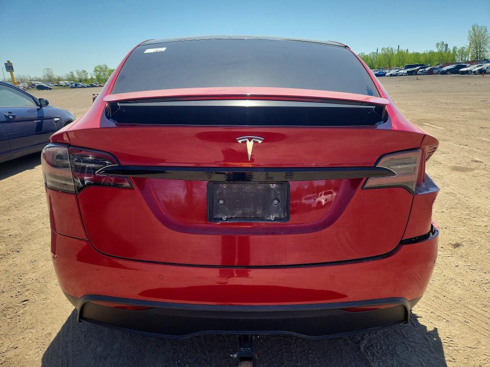 2022 Tesla VIN 7SAXCDE53NF341034 COPART salvage auction — SIDE, Qc - Gravement Accidente, sold $15,750 on 2026-07-07 (photo 6)