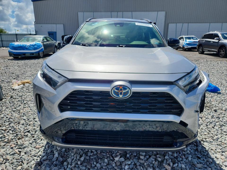 2023 Toyota Rav 4 VIN JTME6RFV6PJ031902 COPART salvage auction — SIDE, Fl - Cert Of Title Slvg Rebuildable, sold $13,500 on 2026-07-08 (photo 5)