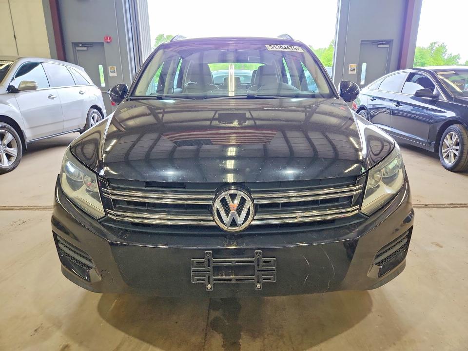 2017 Volkswagen Tiguan VIN WVGBV7AXXHK000324 COPART salvage auction — MINOR DENT/SCRATCHES, Va - Certificate Of Title, sold $4,100 on 2026-07-27 (photo 5)