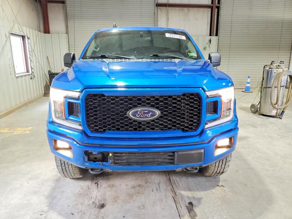 2020 Ford F-150 lightning VIN 1FTEW1E58LKD64173 COPART salvage auction — MINOR DENT/SCRATCHES, WV - CERTIFICATE OF TITLE, sold $16,600 on 2026-07-09 (photo 5)