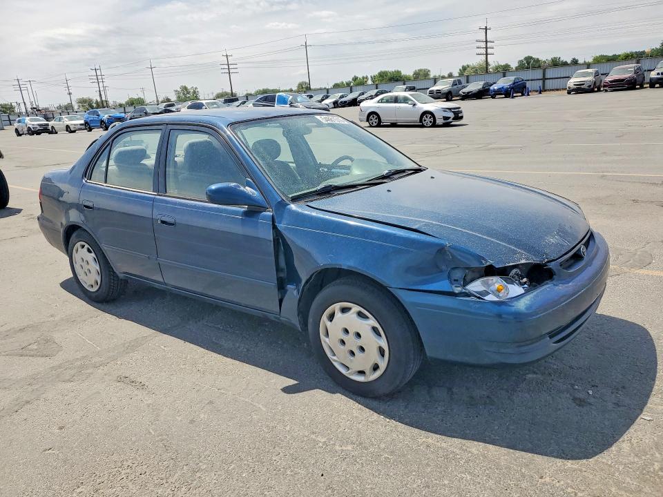 1999 Toyota Corolla VIN 1NXBR12E9XZ210432 COPART salvage auction — SIDE, Id - Salvage Certificate Of Title, sold $150 on 2026-07-09 (photo 4)