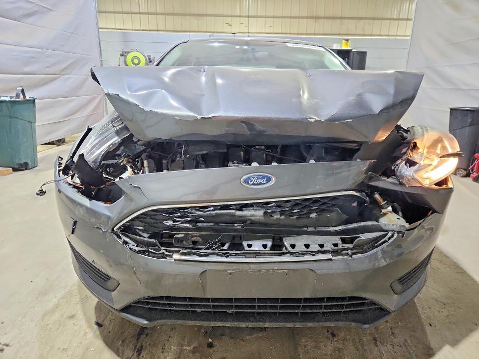 2016 Ford Focus VIN 1FADP3K27GL389053 COPART salvage auction — FRONT END, NH - CERT OF TITLE-SALVAGE, sold $350 on 2026-07-02 (photo 5)