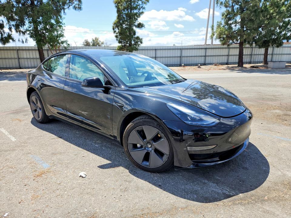 2023 Tesla Model 3 VIN 5YJ3E1EAXPF581783 COPART salvage auction — REAR END, CA - SALVAGE CERTIFICATE, sold $8,200 on 2026-07-21 (photo 4)