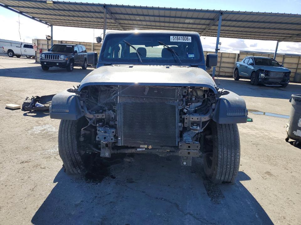 2023 Jeep Wrangler / VIN 1C4GJXAN3PW671314 COPART salvage auction — FRONT END, TX - SALVAGE VEHICLE TITLE, sold $6,300 on 2026-07-24 (photo 5)