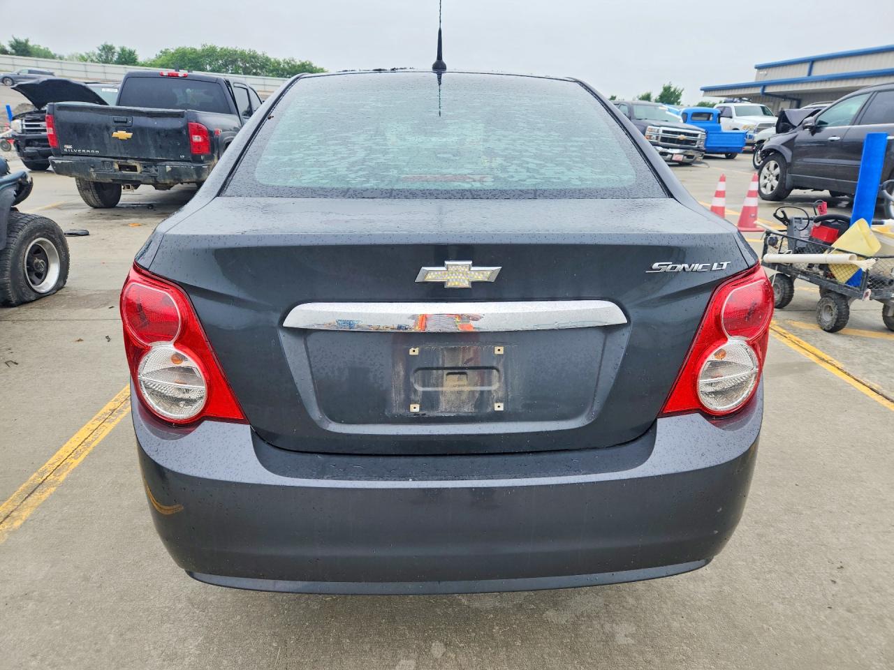 2012 Chevrolet Sonic VIN 1G1JC5SH1C4174161 COPART salvage auction — Side, KY - CERT OF TITLE-SALVAGE, sold $600 on 2026-07-09 (photo 6)