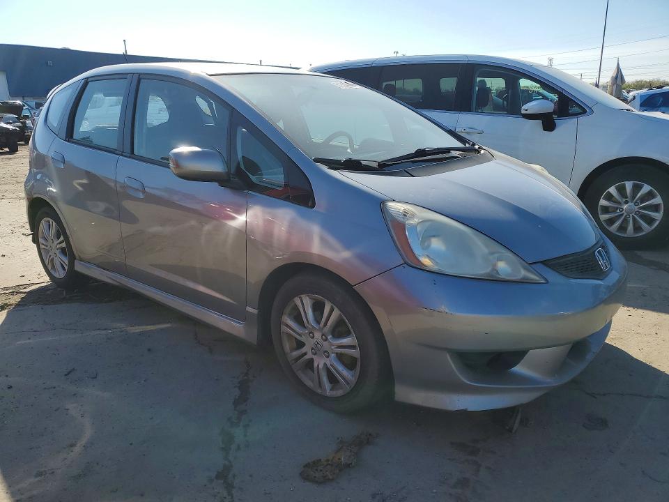 2010 Honda Fit VIN JHMGE8H46AS027665 COPART salvage auction — MINOR DENT/SCRATCHES, MI - CERTIFICATE OF TITLE, sold $2,000 on 2026-07-14 (photo 4)