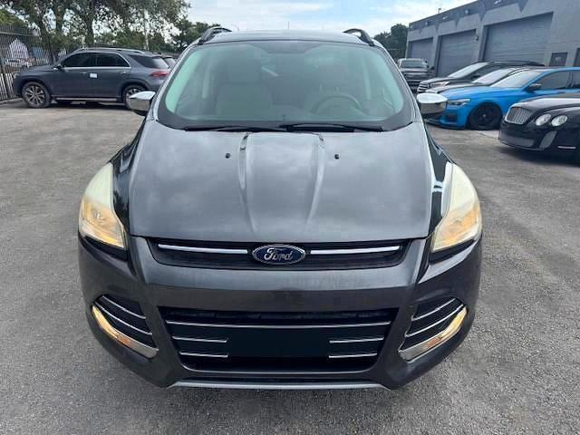 2016 Ford Escape VIN 1FMCU0GX4GUC35892 COPART salvage auction — MINOR DENT/SCRATCHES, Fl - Certificate Of Destruction (P), sold $3,900 on 2026-07-09 (photo 5)