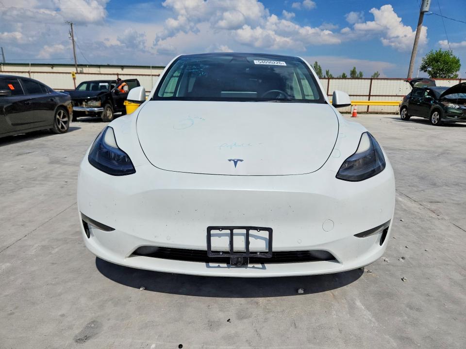 2022 Tesla Model y VIN 7SAYGDEF4NF534729 COPART salvage auction — HAIL, Tx - Certificate Of Title, sold $9,100 on 2026-08-28 (photo 5)
