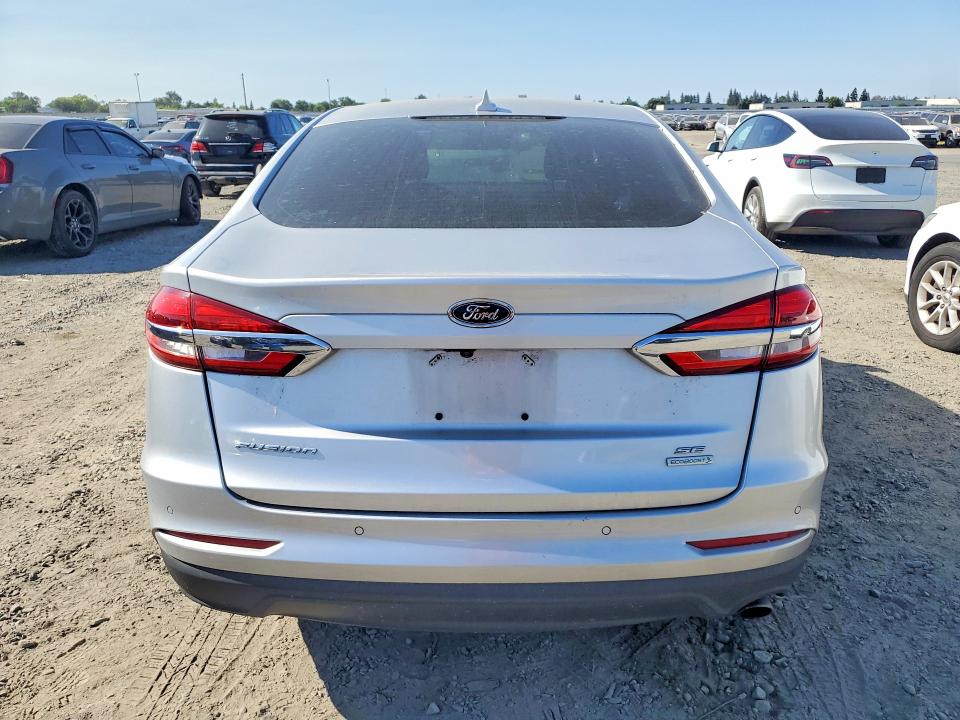 2019 Ford Fusion VIN 3FA6P0HD3KR135785 COPART salvage auction — NORMAL WEAR, Ca - Dis/Dlr/Exp Only Clean Title, sold $1,200 on 2026-07-23 (photo 6)