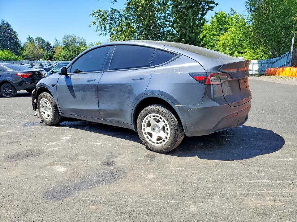 2023 Tesla Model y VIN 7SAYGAEE0PF589025 COPART salvage auction — FRONT END, Or - Salvage Title Certificate, sold $500 on 2026-07-29 (photo 2)