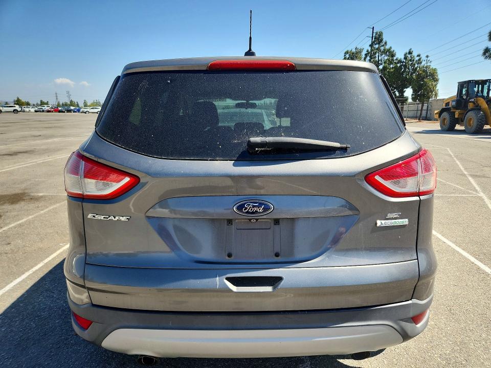2014 Ford VIN 1FMCU0GX2EUD03118 COPART salvage auction — NORMAL WEAR, Ca - Dis/Dlr/Exp Only Clean Title, sold $975 on 2026-07-03 (photo 6)