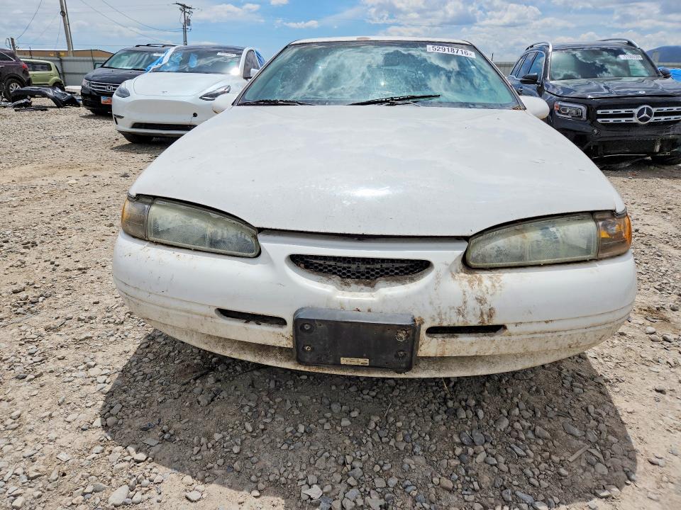 1997 Ford Thunderbird VIN 1FALP62W9VH148577 COPART salvage auction — MECHANICAL, Ut - Certificate Of Title, sold $650 on 2026-07-09 (photo 5)
