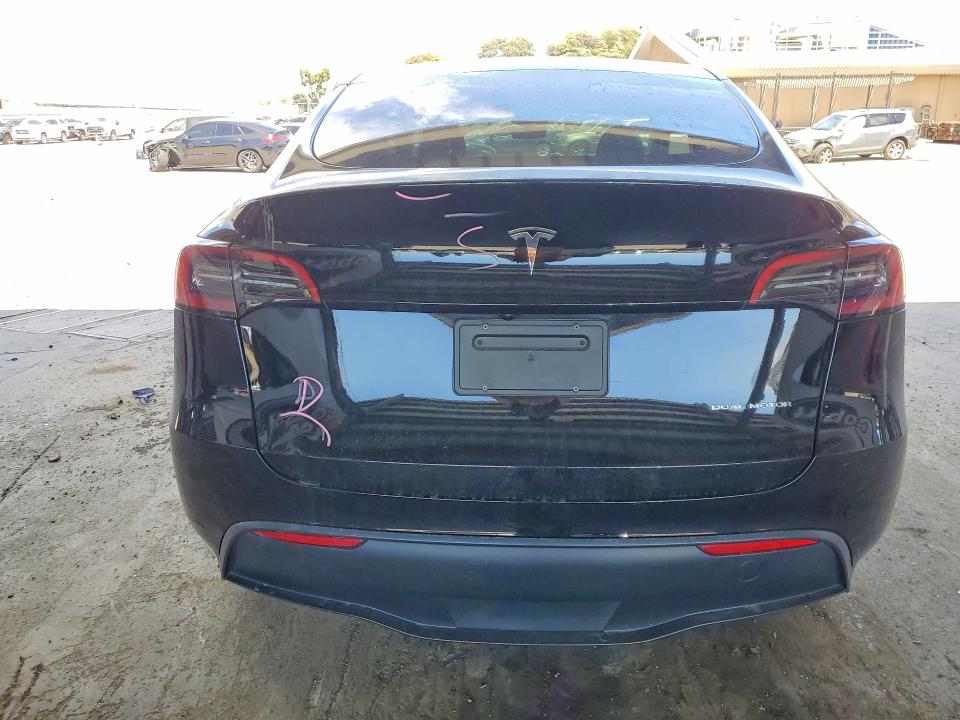 2023 Tesla Model y VIN 7SAYGDEE2PF892342 COPART salvage auction — SIDE, CA - SALVAGE CERTIFICATE, sold $7,800 on 2026-07-21 (photo 6)