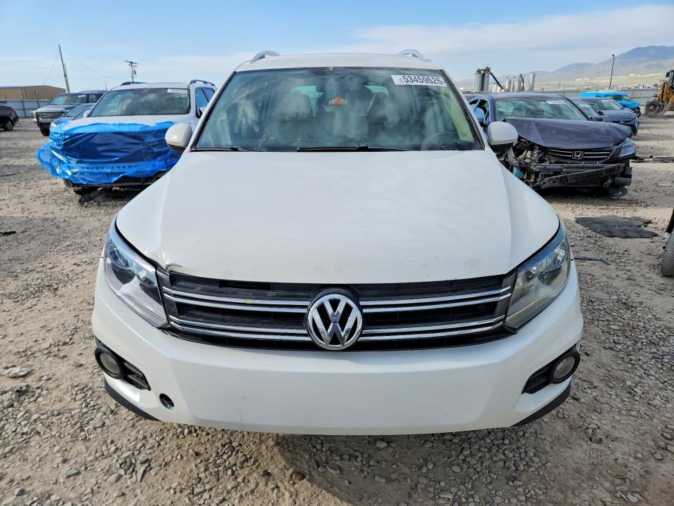 2013 Volkswagen Tiguan VIN WVGAV3AXXDW560464 COPART salvage auction — MINOR DENT/SCRATCHES, Mt - Certificate Of Title, sold $350 on 2026-07-31 (photo 5)