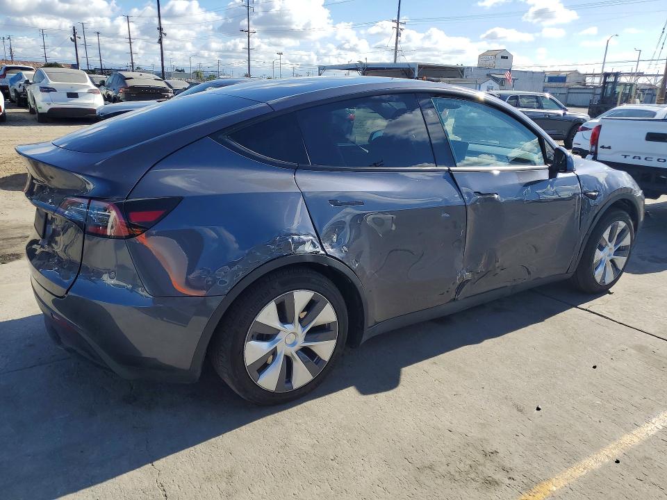 2023 Tesla Model y VIN 7SAYGDED3PF941314 COPART salvage auction — SIDE, Ca - Salvage Certificate, sold $12,600 on 2026-07-29 (photo 3)